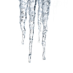 Icicles hanging from a roof in wintertime sunshine