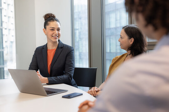 Young employee in a meeting with her manager