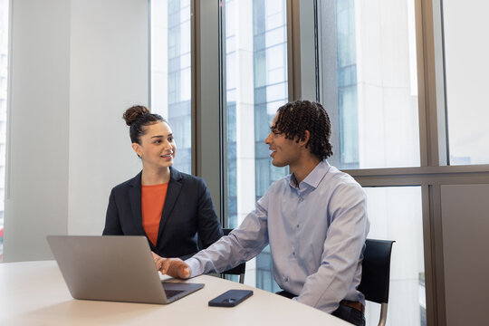 New employees working together in a corporate office