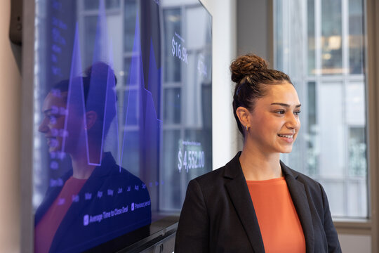 Focused young Businesswoman giving her first presentation in a new job - Powered by Adobe