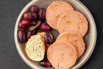 Foie gras pate goose liver delicacy tasty snack fresh delicious gourmet food background on the table rustic top view copy space