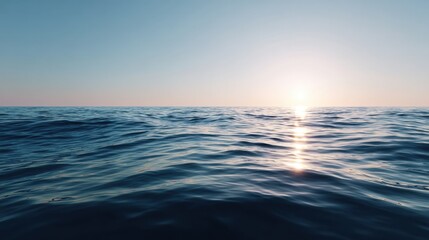 Obraz premium Serene Ocean Horizon at Sunrise with Soft Waves Reflecting Warm Light and Calming Skies for Tranquil Background or Nature-Themed Projects