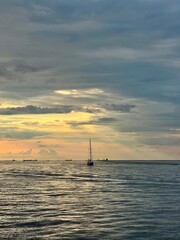 silhouette of a yacht at sunset