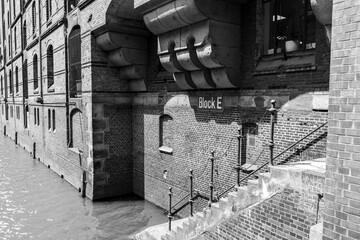 Wide angle view of historic Speicherstadt and modern Hafencity architecture in Hamburg