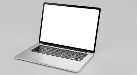 Sleek silver laptop with a blank white screen on a minimalist gray surface perfect for showcasing websites applications or creative designs in a modern style