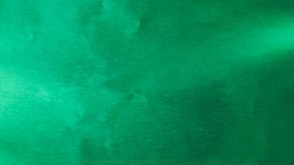 Vibrant Emerald Green Origami Paper Texture with Subtle Creases and Gradation