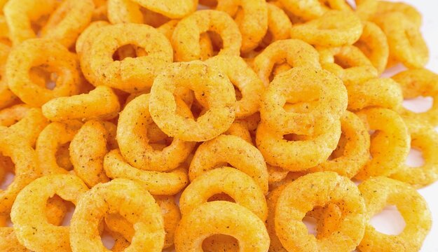 Puffed corn ring chips with salt and oregano