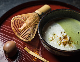 Close-Up Japanese Matcha Ceremony Still Life with Chasen Whisk, Frothy Matcha Bowl, and Mochi on Lacquer Tray