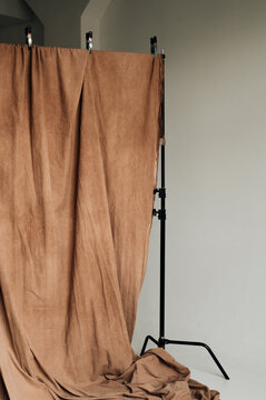 Brown fabric backdrop in a photo studio