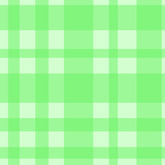 Seamless green checkered pattern with varying shades creates vibrant and lively design