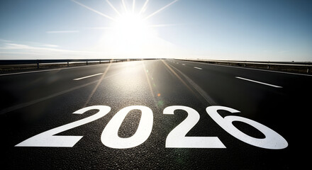 A bright future unfolds on a dark highway with the year 2026 emblazoned on the asphalt, symbolizing a clear path forward toward future goals and reflecting ambition under the radiant sunshine, a