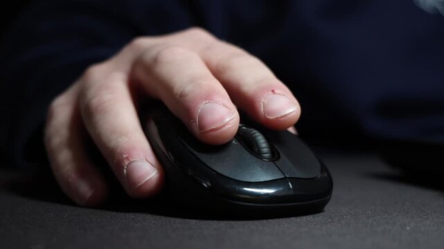 use of a computer mouse to click and scroll on technology