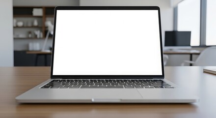 Laptop with a blank white screen on a wooden desk in a modern office setting ready for content insertion and showcasing digital designs and business presentations
