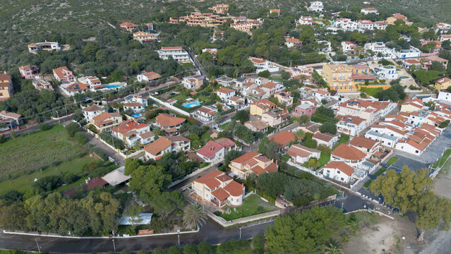 Coastal village and turquoise bay of Maladroxia in Sant Antioco.