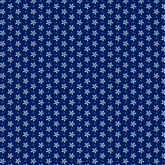 Abstract geometric pattern of small white flowers on a deep blue textured background