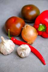 Fresh vegetables. peppers, tomatoes, onions and garlic