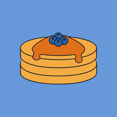 Stack of pancakes with syrup and blueberries
