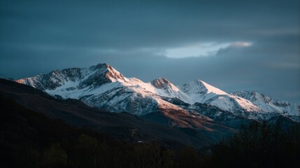 Obraz premium Majestic alpenglow on rugged mountain peaks, enchanting alpine serenade, perfect for Winter Solstice contemplation and International Mountain Day reverie