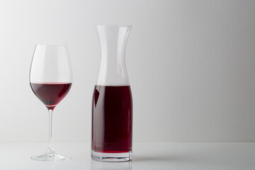 Red wine glass on white background