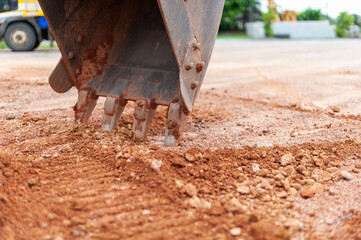 Heavy machinery excavation close-up earth digging at industrial construction site