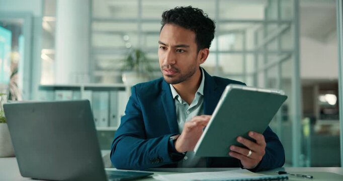 Laptop, tablet and reading with business man in office for broker email, account manager or research. Digital portfolio, investment advisor and online report with person in agency for risk assessment