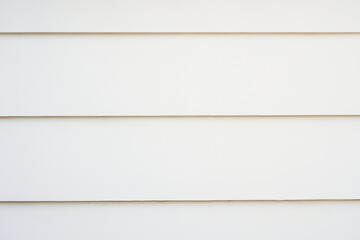 抽象的でモダンな印象の白い塗り壁のクローズアップ