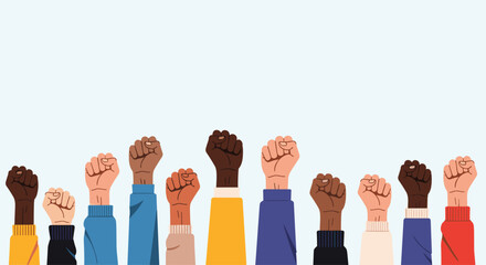 Fototapeta premium Diverse group of raised fists in solidarity against a light blue background.