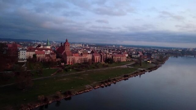 Drone panorama of Grudziadz skyline with the 14th-century Granaries complex and the winding Vistula River, Poland