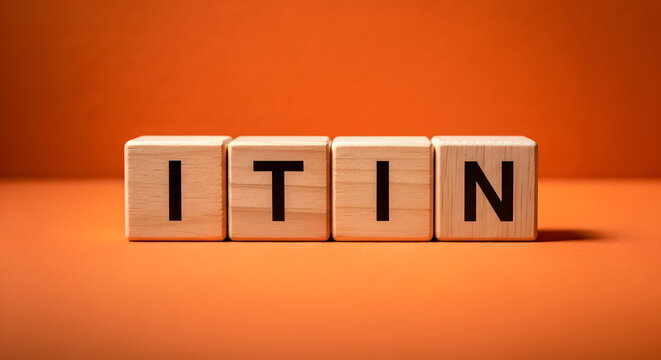Itin spelled out with wooden blocks on an orange background representing individual taxpayer identification number used for tax purposes and compliance in the united states for non residents