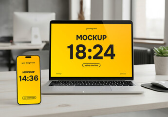 Laptop and Smartphone Mockup on Desk in Modern Office, responsive design. PSD Smart Layer Display