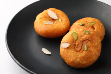 Balushahi, a traditional Indian dessert. This sweet is popular in North India, Odisha, and Bihar, and a similar pastry known as Badusha is found in South India. 