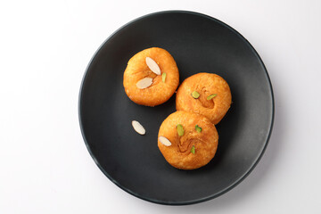 Balushahi, a traditional Indian dessert. This sweet is popular in North India, Odisha, and Bihar, and a similar pastry known as Badusha is found in South India. 