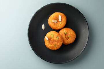 Balushahi, a traditional Indian dessert. This sweet is popular in North India, Odisha, and Bihar, and a similar pastry known as Badusha is found in South India. 