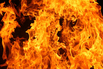 Blurred illustration of burning fire flame. Burning fire flame on black background.
