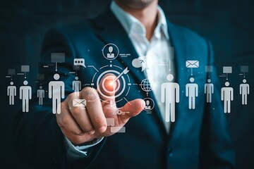 Target Audience and Digital Outreach Strategy Concept. Businessperson points at virtual interface with people icons and marketing symbols, representing audience targeting and global digital strategy.