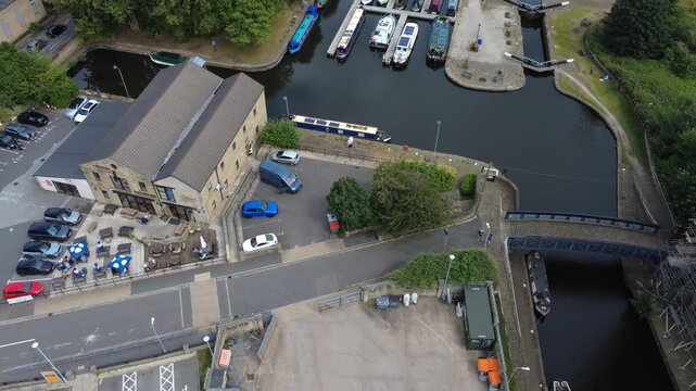 aerial drone view of Brighouse Basin a former inland port on the Calder and Hebble Navigation canal now a mooring for house boats and leisure craft