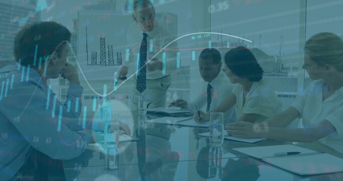 Pointing speaker in dress shirt, tie at glass conference table, showing stock overlay on whiteboard