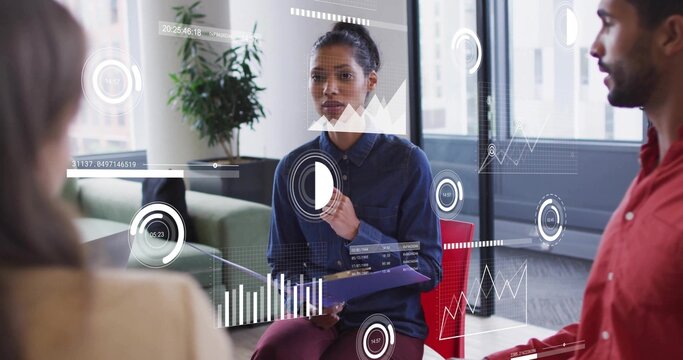 Presenting woman wearing navy shirt and maroon pants in office holding purple folder with AR graphs