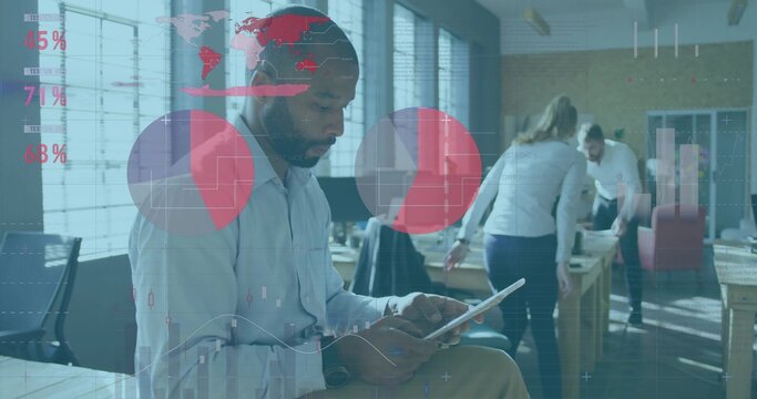 Using man wearing light blue shirt tapping tablet at open office with desks and data overlays