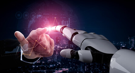 A close-up of a human hand and a robotic hand reaching toward each other, symbolizing connection in...