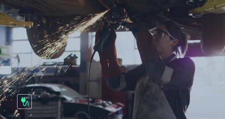 Grinding woman tech wearing PPE using grinder under lifted car on hydraulic lift sparks, copy space