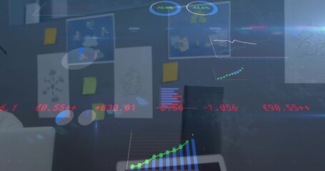 Showing hologram charts in meeting room with pinned sketches, sticky notes, laptop, red numbers