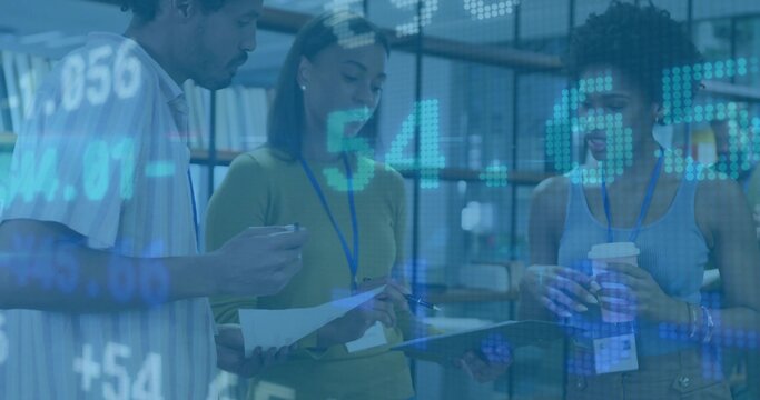 Reviewing three colleagues with lanyards holding tablet, papers, coffee in office with blue overlay - Powered by Adobe