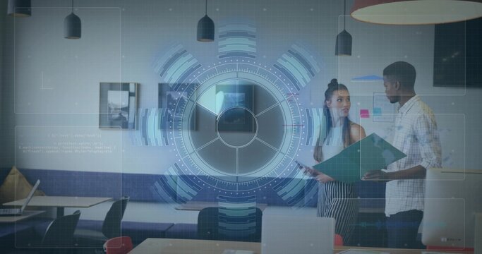 Reviewing green folder coworkers in checked shirt, sleeveless top at office with HUD, copy space - Powered by Adobe