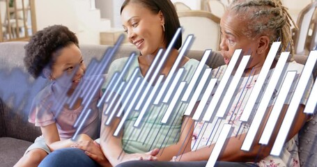 Child turning toward mother starting health chat on couch while diagonal white blue bars obscuring