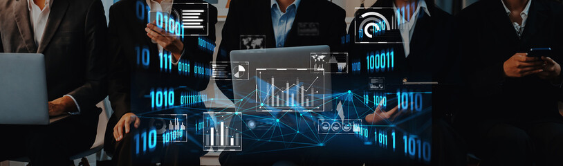 A diverse group of professionals engaged with modern technology showcases digital data visuals and...