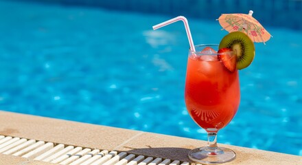 Refreshing summer cocktail by the swimming pool perfect for a tropical vacation getaway holiday resort
