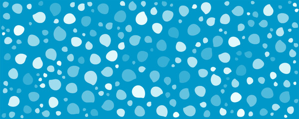 Light blue background and randomly placed flakes. Vector seamless pattern of white dots of different sizes.