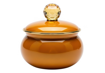 Ornate amber ceramic jar with golden lid isolated on transparent background