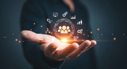 Hand holding glowing digital network of people and business icons